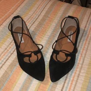 Black strappy flats